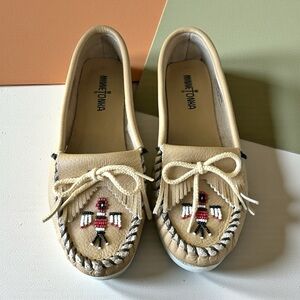 Minnetonka Women's Tan Moccasins with beading and stitching